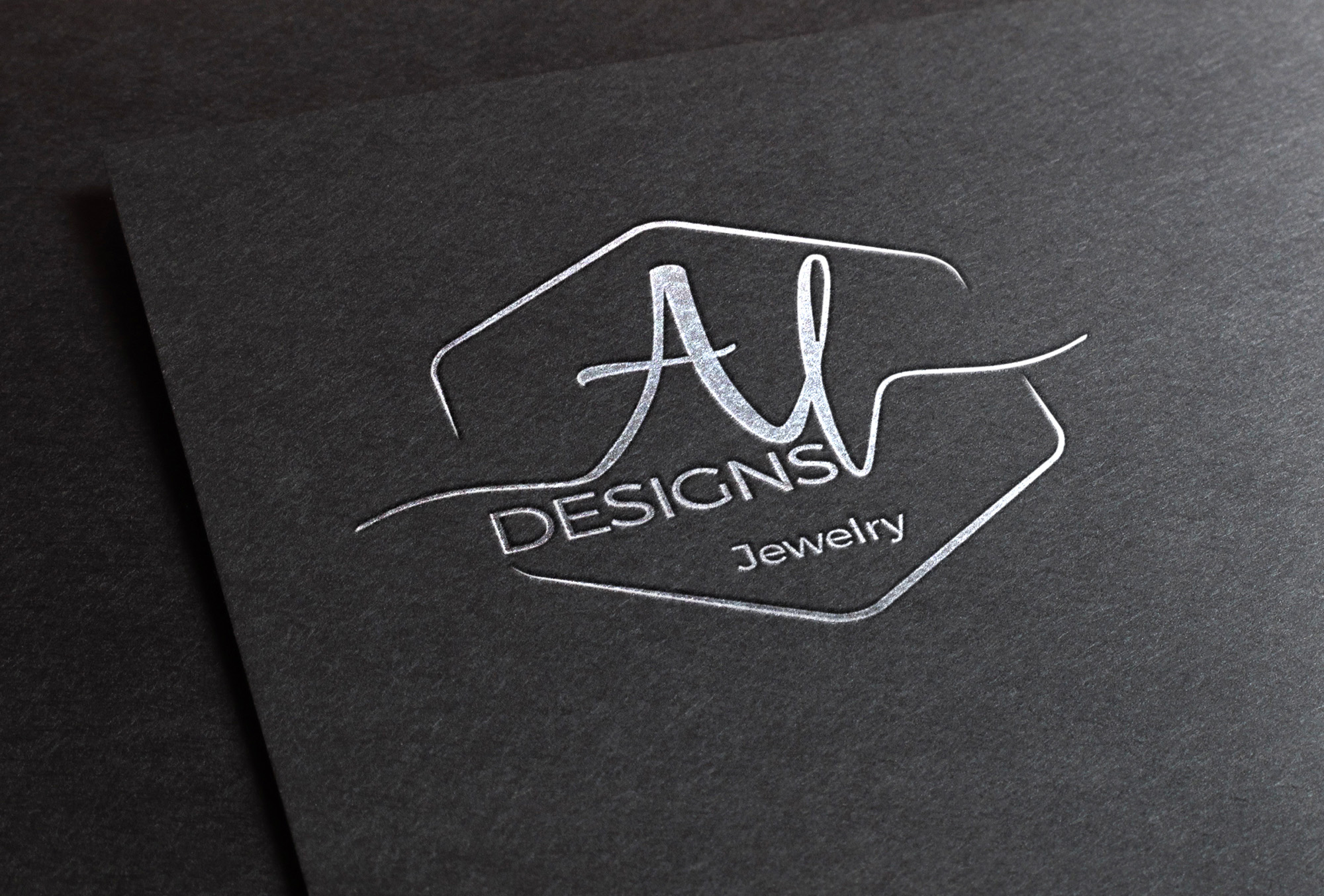 Realizzazione grafica Logo gioielleria Al Designs Jewelry argento su fondo nero